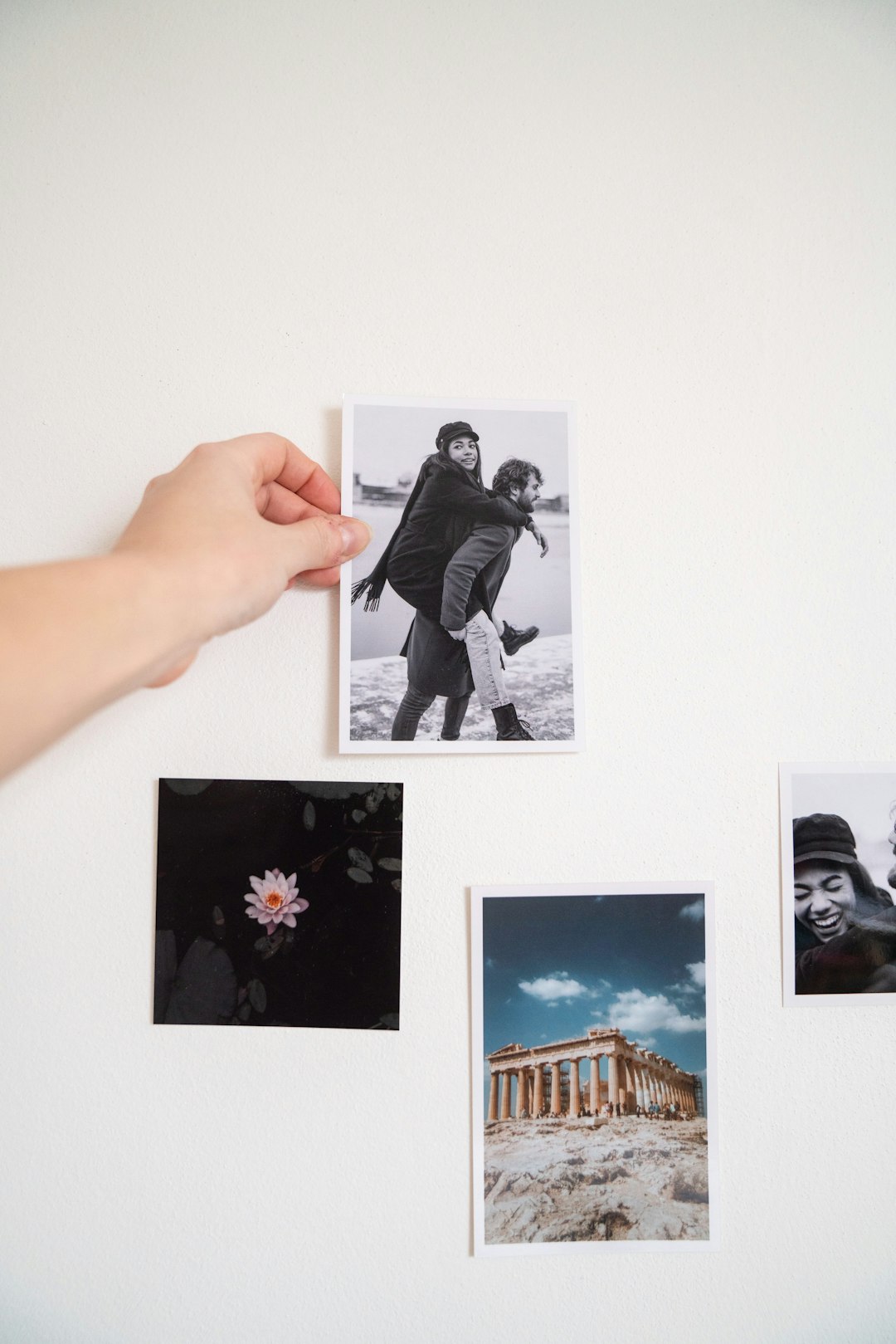 hero-img-01 displaying photos on a wall
